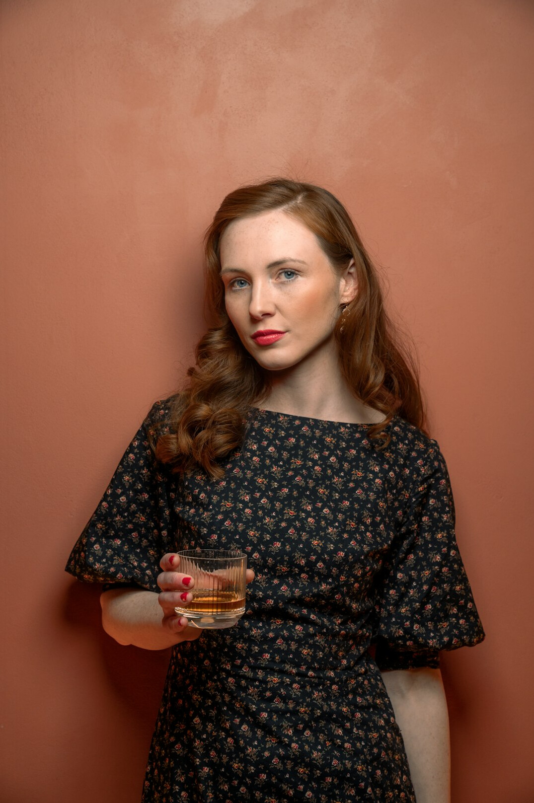Studio portrait of a white woman senior editor and writer